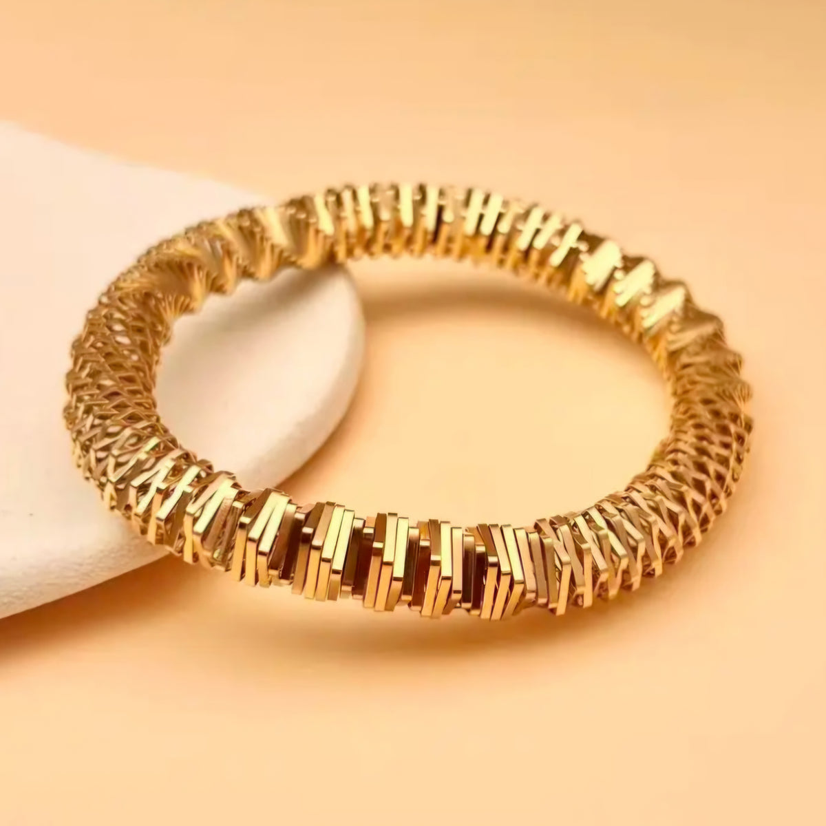 Bracelet extensible doré tressé ✨