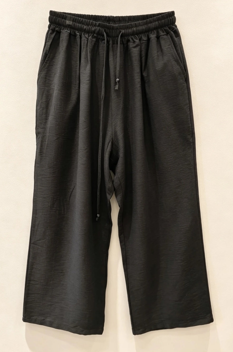 Pantalon grande taille fluide à poches